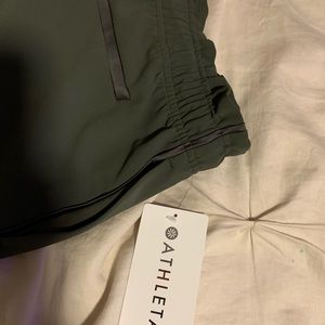 Hunter green Athleta dress up or down pants.